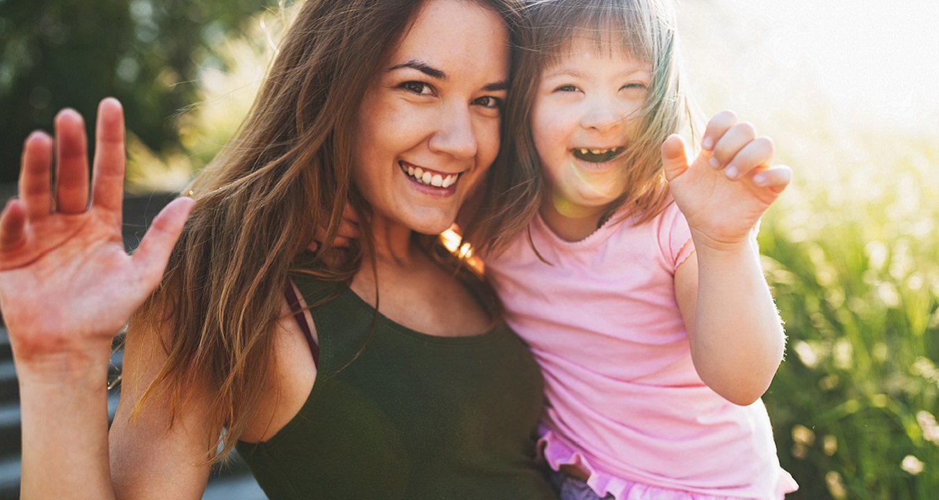 Little girl with special needs enjoy spending time with mother